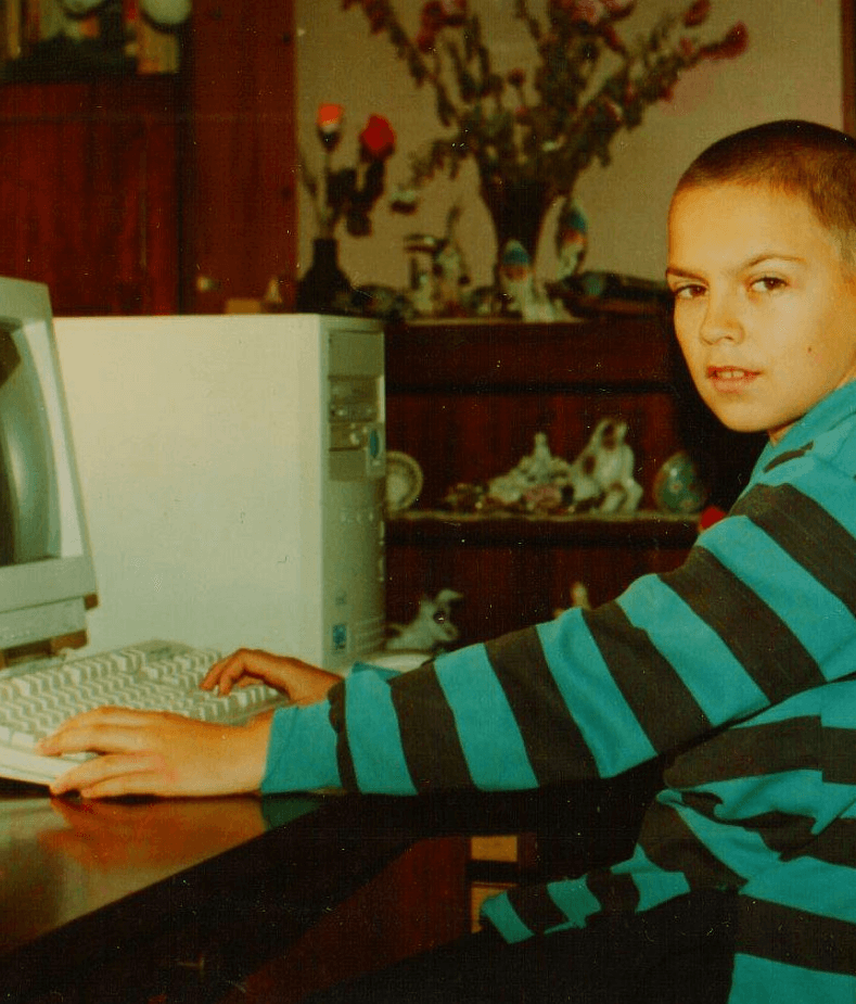 Andy as a kid, at his first computer